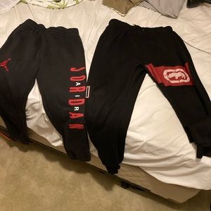2 pairs of sweat pants youth large and xl Nike/ecko